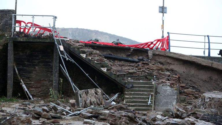 A partially collapsed harbour wall in Portreath, Cornwall, after Storm Eleanor lashed the UK