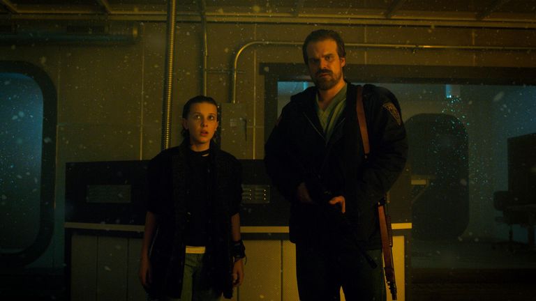 Harbour as Jim Hopper and Millie Bobby Brown as Eleven in Stranger Things