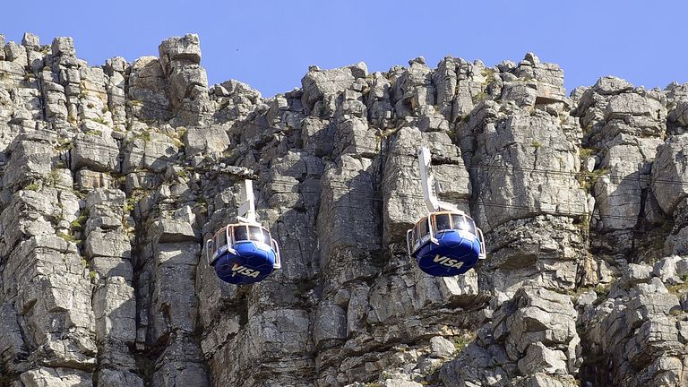 Rescue workers abseiled from a cable car to rescue the survivor