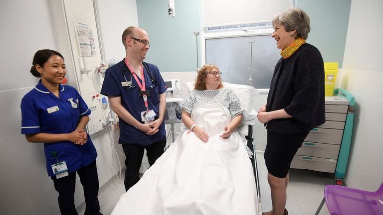 Mrs May spoke to patients and staff on a visit to Frimley Park Hospital in Surrey