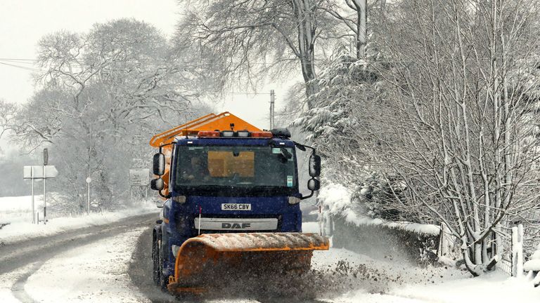 A snow plough clears the road close to Greenloaning in Perthshire