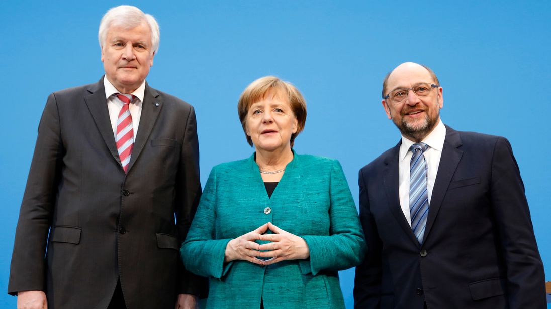 The leaders of the coalition parties at a press conference 