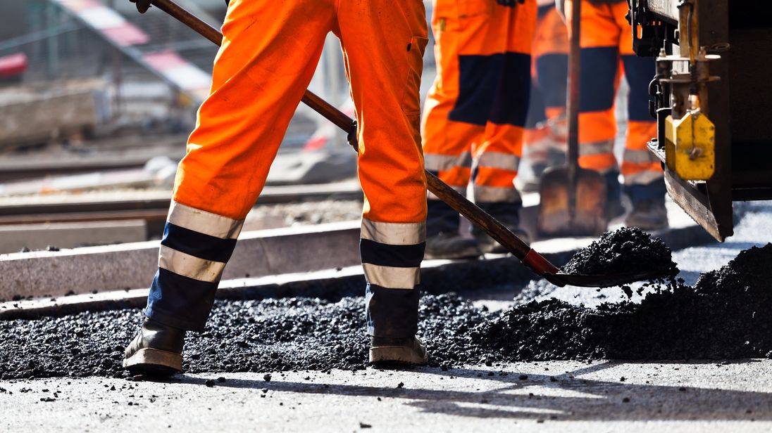 Workers on a road construction