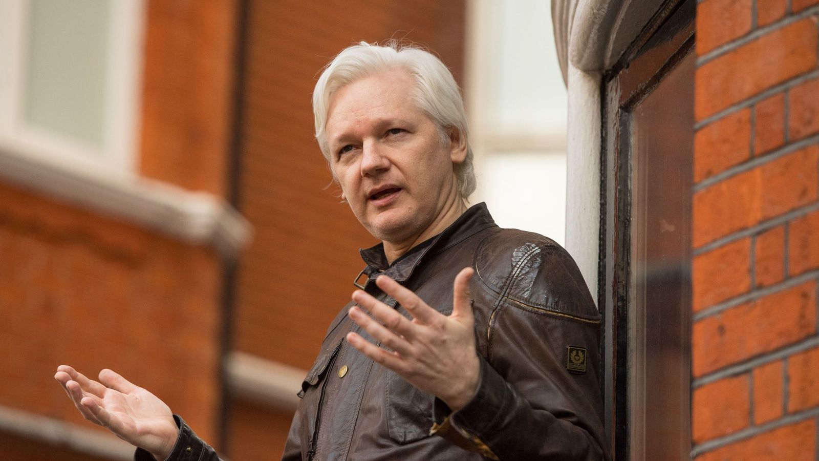 Judge tells Julian Assange to have 'courage' to face court 