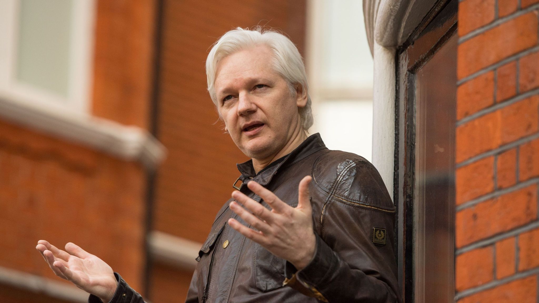 Judge tells Julian Assange to have 'courage' to face court as he loses