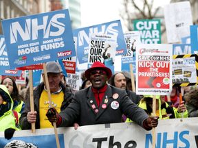 Demonstrators marched in support of the NHS, calling for more funding