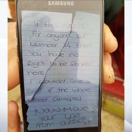 Woman charged over angry note on ambulance