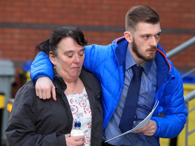 Tom Evans and his mother outside court in Liverpool