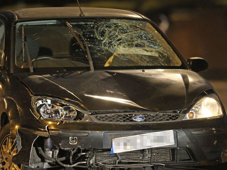 The black Ford Focus found by police had its front smashed in