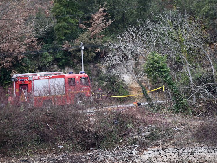 Firefighters work at the site of an accident near Carces lake, about 50 kilometres (30 miles) northwest of the resort of Saint-Tropez