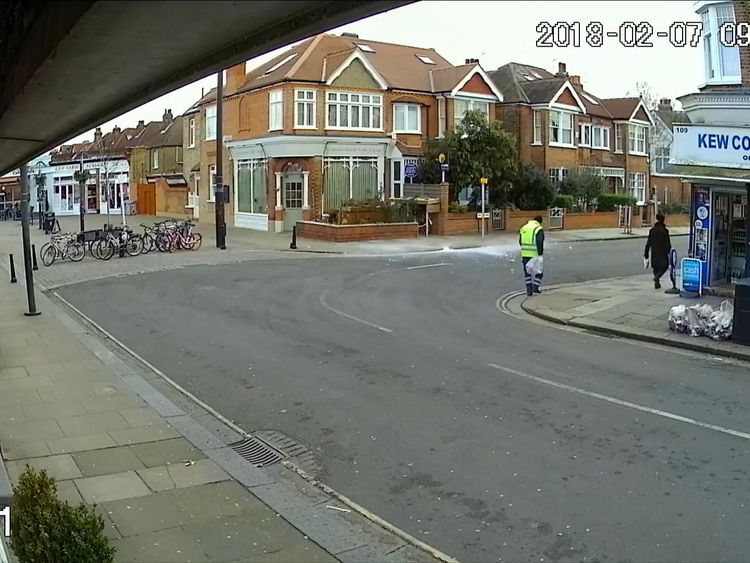 A block of ice falls from the sky near a man in North Road, Kew, west London. Pic: Mos Sayed