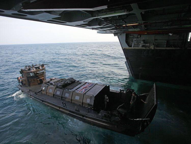 A Royal Marine landing craft births on HMS Albion during an exercise in 2010