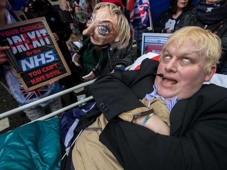 A Boris Johnson lookalike was wheeled through the streets