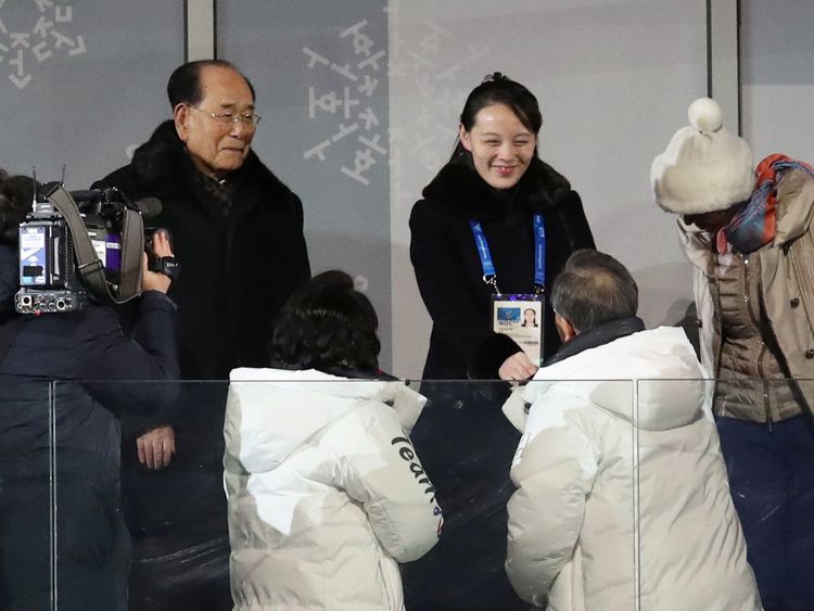 Kim Yo Jong and President Moon Jae-in shake hands