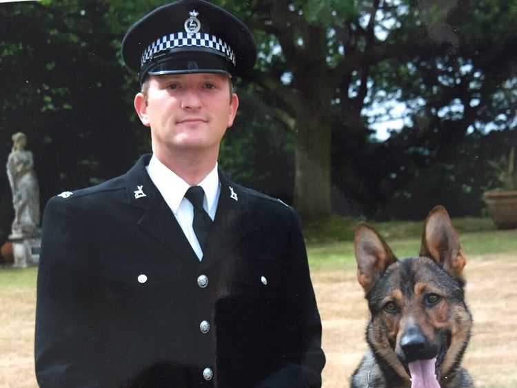 PC Dave Wardell and his police dog, Finn, were chasing a robbery suspect in 2016 when they were attacked with a knife. - GIVEN BY PR