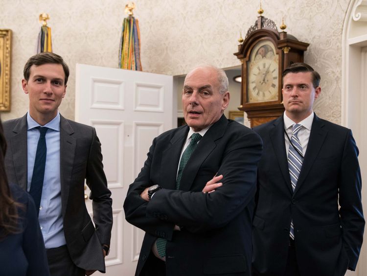 Jared Kushner (L), White House chief of staff John Kelly (C) and White House staff secretary Rob Porter 