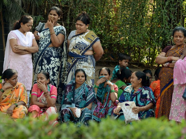 Women have gathered outside Sridevi's Mumbai house to mourn the actress