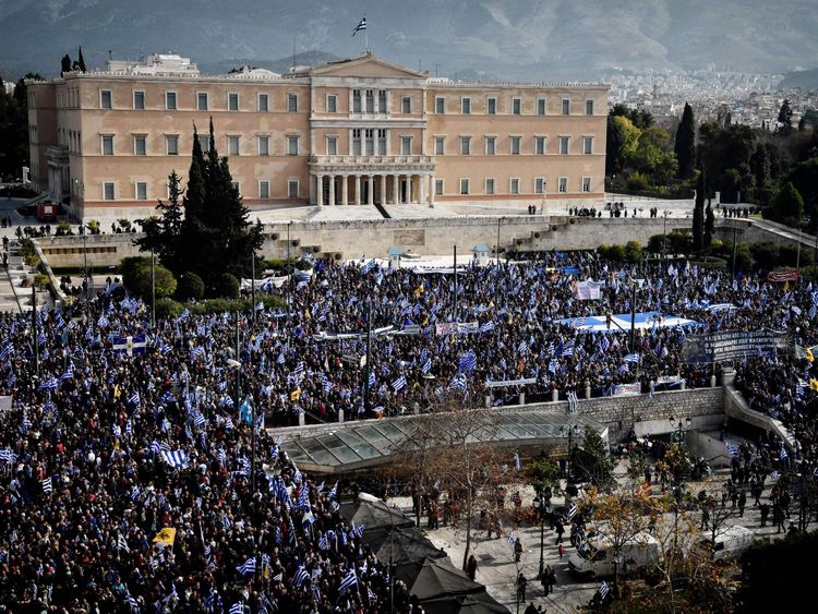 People demonstrate to urge the government not to compromise in the festering name row with neighbouring Macedonia, in front of the parliament of Greece, located in the Old Royal Palace (background), at the Syntagma Square in Athens, on February 4, 2018