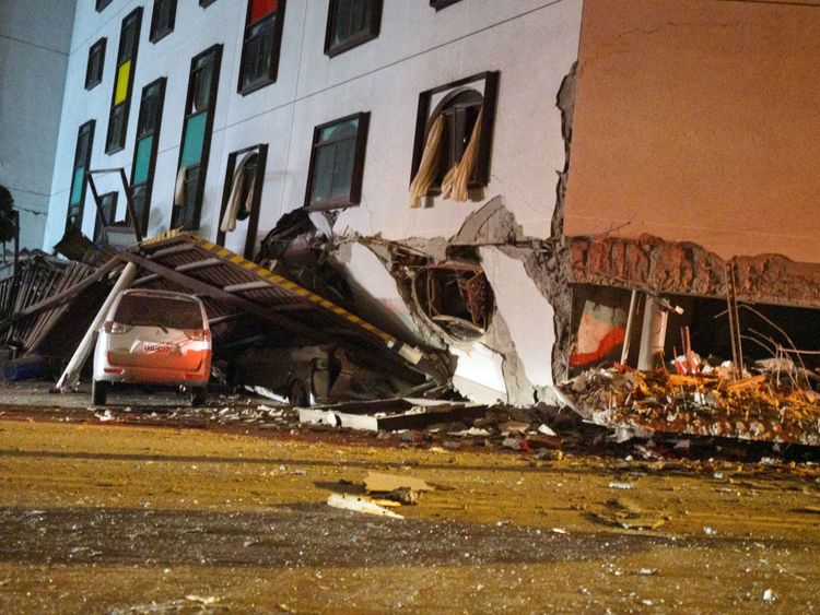 A damaged vehicle stands in rubble outside the Marshal Hotel in Hualien, eastern Taiwan early February 7, 2018, after a strong earthquake struck the island. A hotel on the east coast of Taiwan has collapsed after a 6.4-magnitude earthquake, the government said. / AFP PHOTO / PAUL YANG / Taiwan OUT (Photo credit should read PAUL YANG/AFP/Getty Images)