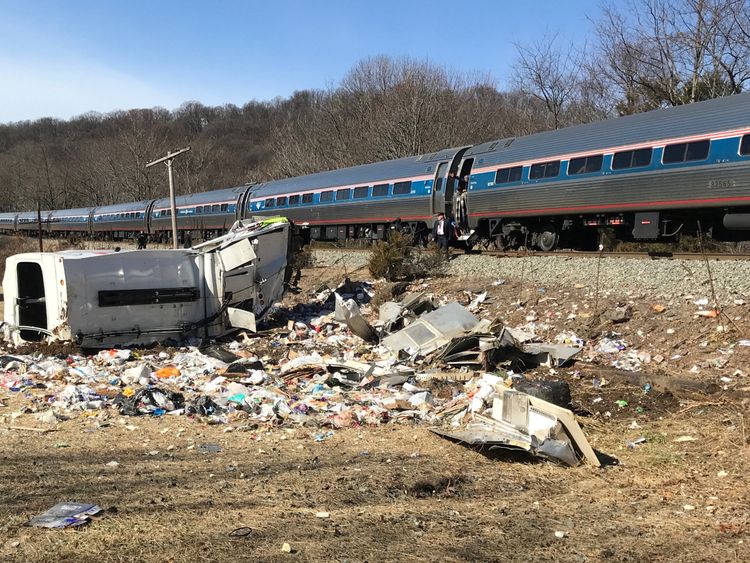 An Amtrak passenger train carrying Republican members of the U.S. Congress from Washington to a retreat in West Virginia is seen after colliding with a garbage truck in Crozet, Virginia