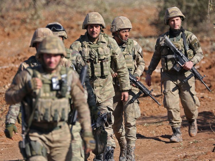 Turkish soldiers are deployed on Mount Bersaya, north of the Syrian town of Azaz near the border with Turkey, on January 29, 2018. Turkey launched operation &#39;Olive Branch&#39; on January 20 against the Syrian Kurdish People&#39;s Protection Units (YPG) militia in Afrin, supporting Syrian opposition fighters with ground troops and air strikes