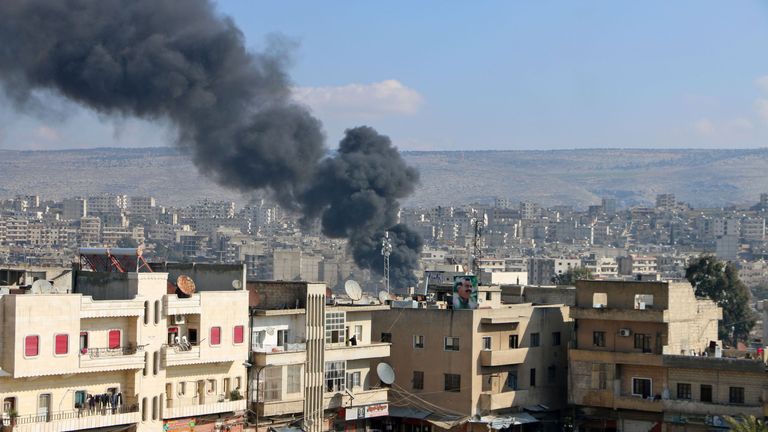 Smoke is seen billowing from the northern Syrian Kurdish town of Afrin on January 31, 2018. Turkey and allied Syrian rebel groups launched operation Olive Branch on January 20 against the Kurdish People&#39;s Protection Units (YPG), which controls the Afrin region