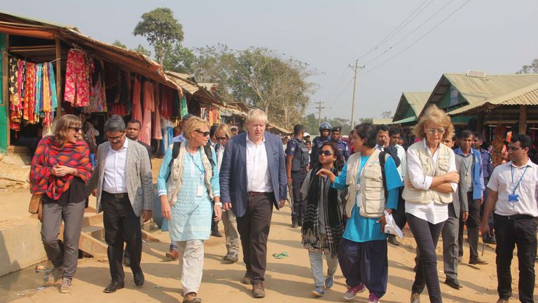 British Foreign Secretary Boris Johnson (C) walks inside a Rohingya refugees camp in Bangladesh&#39;s Cox&#39;s Bazar district on February 10, 2018. Johnson visited camps for Rohingya refugees who have fled from Myanmar, on his second day of a two-day visit to Bangladesh. / AFP PHOTO / - (Photo credit should read -/AFP/Getty Images)
