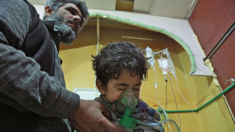 A Syrian child receives treatment for a suspected chemical attack in eastern Ghouta