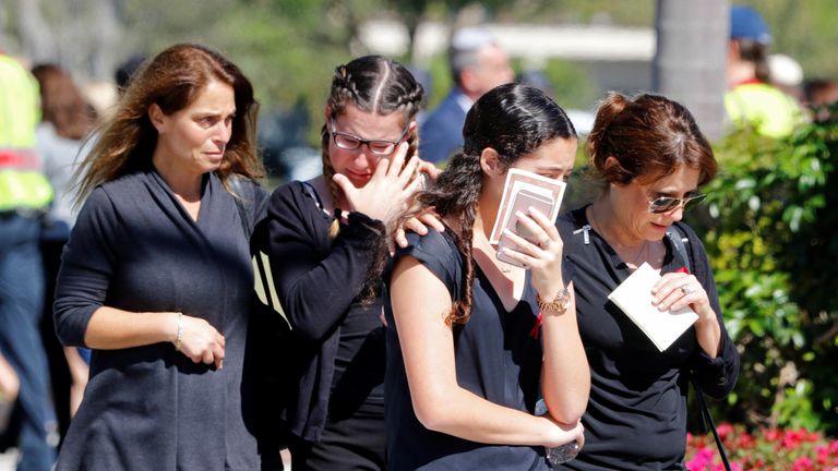 Mourners break down in tears at the funeral of 14-year-old Alyssa Alhadeff 