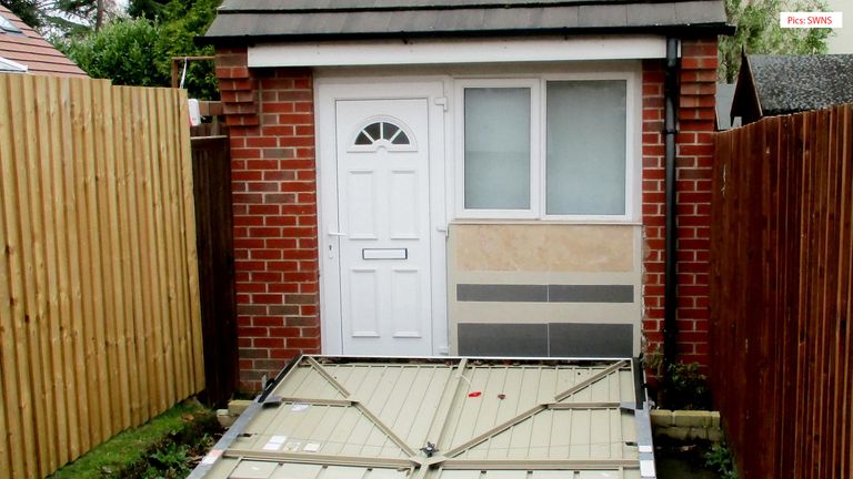 Couple Fined For Using Garage Door To Hide Secret Home From Council The Couple Used A Fake Garage Door To Hide Secret Home Pic Swns