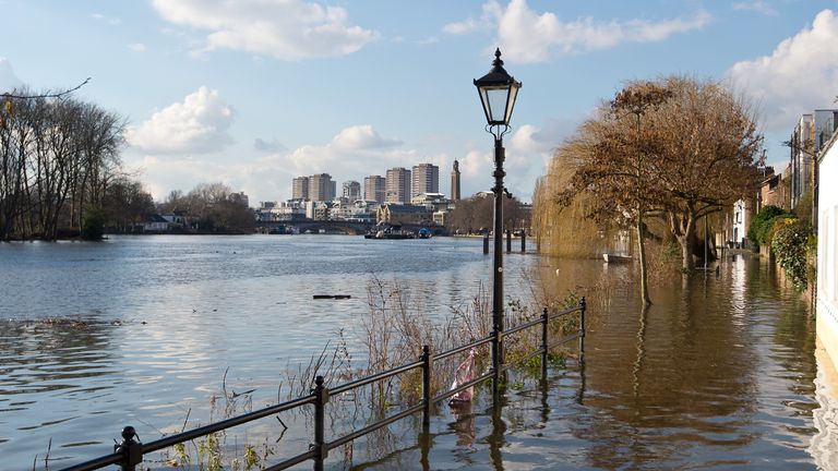 The Thames floods a riverside footpath in 2016