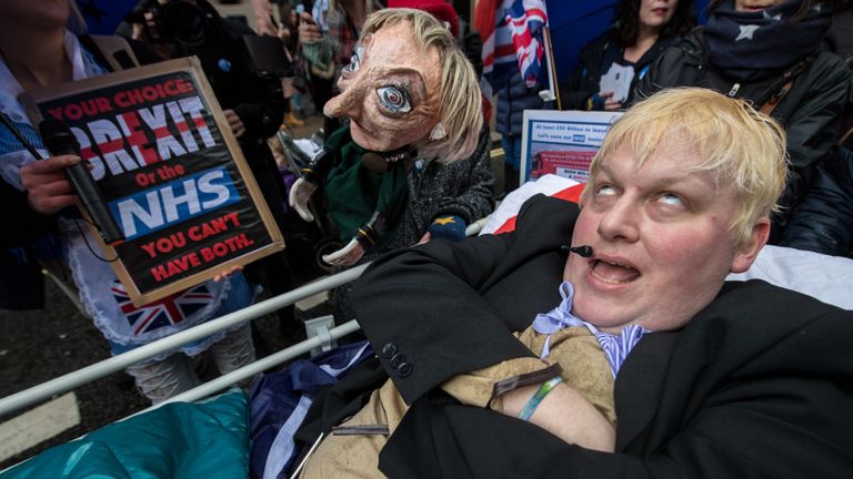 A Boris Johnson lookalike was wheeled through the streets
