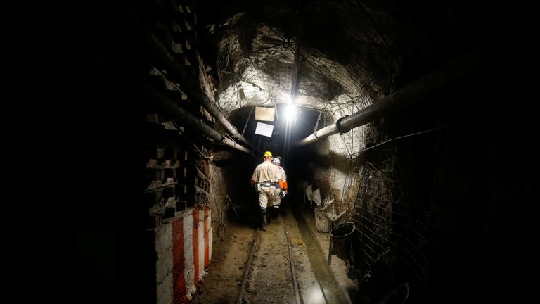 Hundreds of workers trapped underground in South African gold mine ...