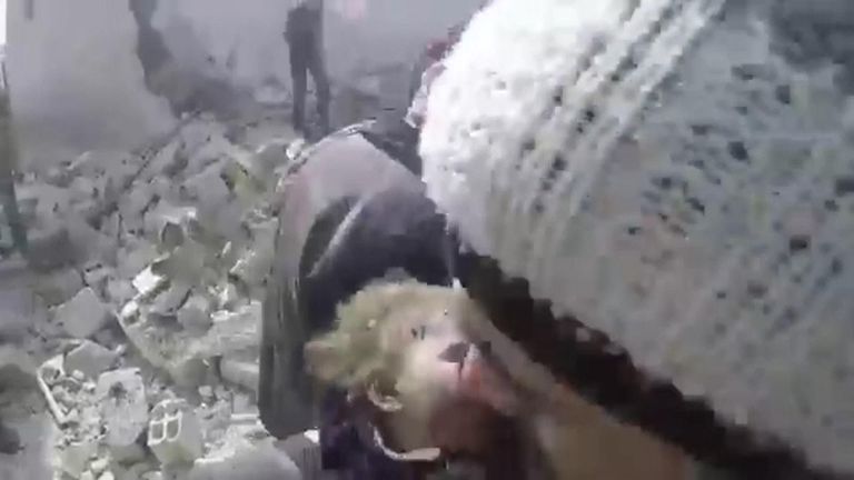 Baby girl pulled from under rubble after strikes on eastern Douma