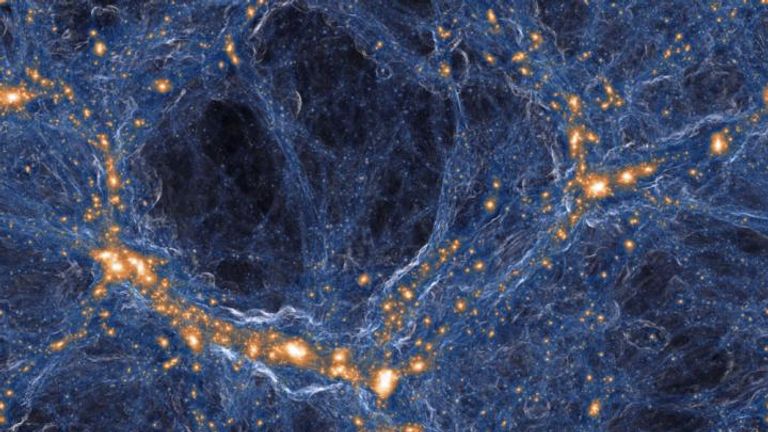 Visualization of the intensity of shock waves in the cosmic gas (blue) around collapsed dark matter structures (orange/white). Similar to a sonic boom, the gas in these shock waves is accelerated with a jolt when impacting on the cosmic filaments and galaxies.

Pic: IllustrisTNG collaboration
