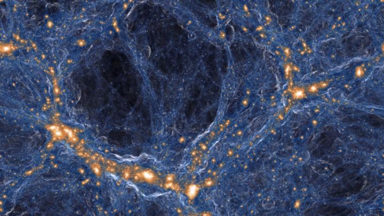 Visualization of the intensity of shock waves in the cosmic gas (blue) around collapsed dark matter structures (orange/white). Similar to a sonic boom, the gas in these shock waves is accelerated with a jolt when impacting on the cosmic filaments and galaxies.

Pic: IllustrisTNG collaboration
