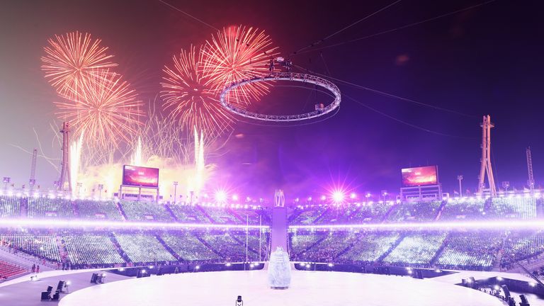 Fireworks light up the sky as the Winter Olympics opening ceremony begins
