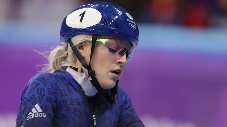 Elise Christie of Great Britain looks dejected after crashing out during the Ladies Short Track Speed Skating 1000m 