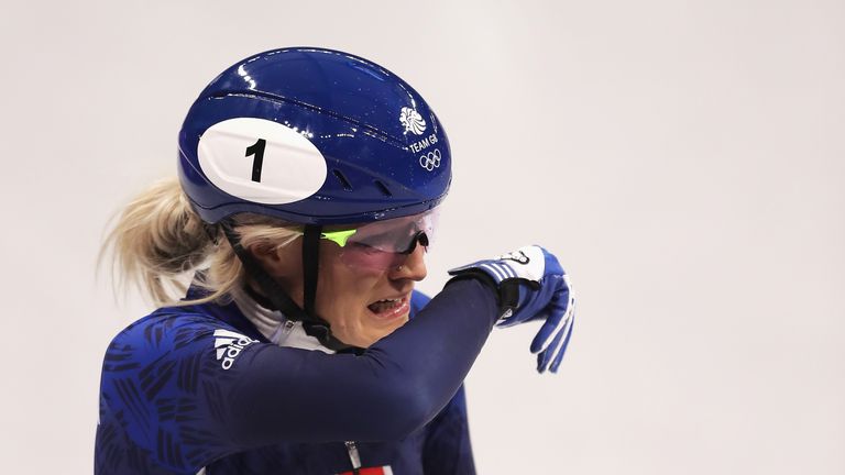 Elise Christie appears visibly upset after crashing during the Women's 500m Short Track Speed Skating final
