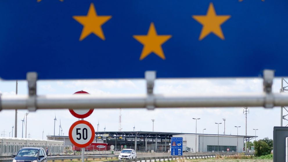 A car drives from Austria at the border crossing for the Austrian-Hungarian frontier