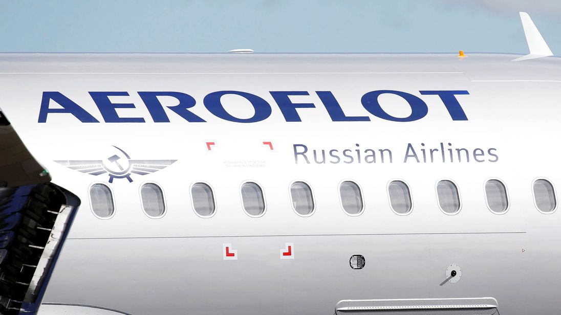 British officials search Russian plane in London British officials search Russian plane in London