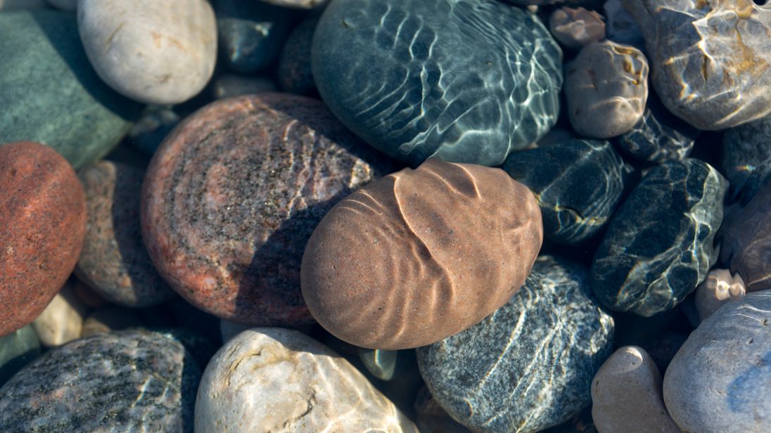 River stones could help youngsters and their teachers "fight back against an intruder"