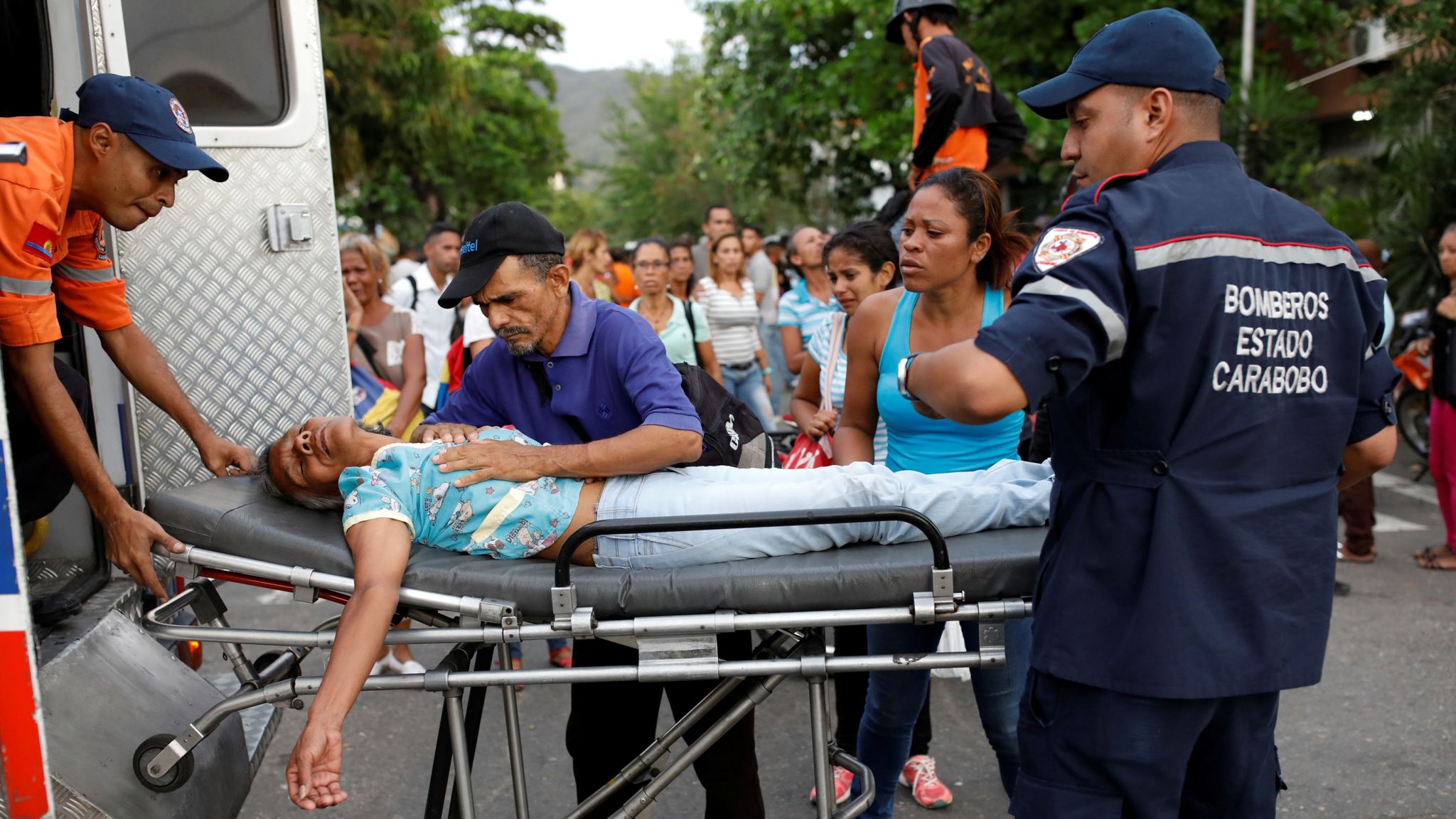 Families tear-gassed as 68 prisoners die in fire at jail in Venezuela ...