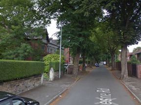 The police officer was slashed with a sword in Demesne Road, Whalley Range, Manchester. Pic: Google Street View