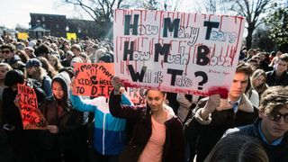 Students waving banners in Washington