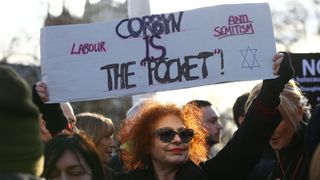   Protesters gather on Parliament Square, Westminster 