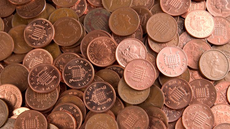 Lots of British one pence coins