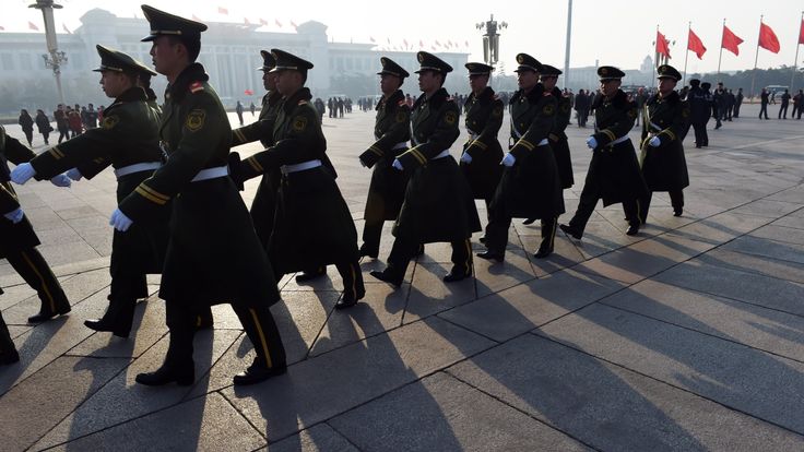 Paramilitary police patrol in Tiananmen Square