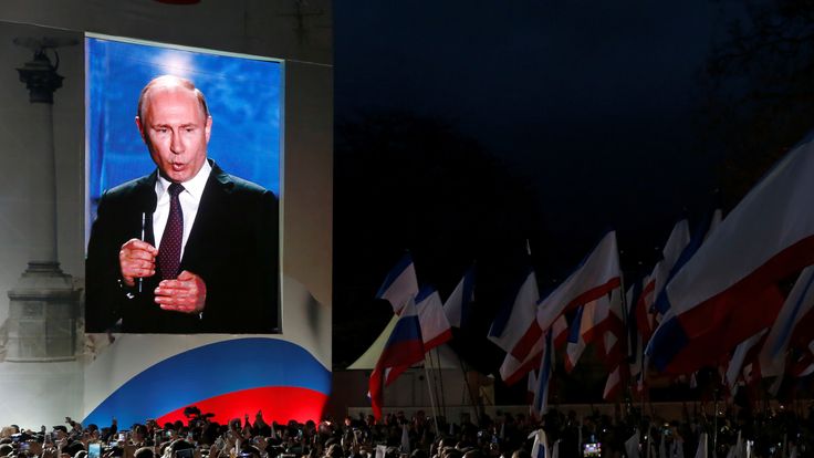 Russian president Vladimir Putin addresses the audience during a rally marking the fourth anniversary of Russia&#39;s annexation of Ukraine&#39;s Crimea region in the Black Sea port of Sevastopol, Crimea, March 14, 2018