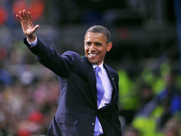 US President Barack Obama greets fans after delivering a speech to crowds of people during a public rally at College Green in Dublin, Ireland, on May 23, 2011